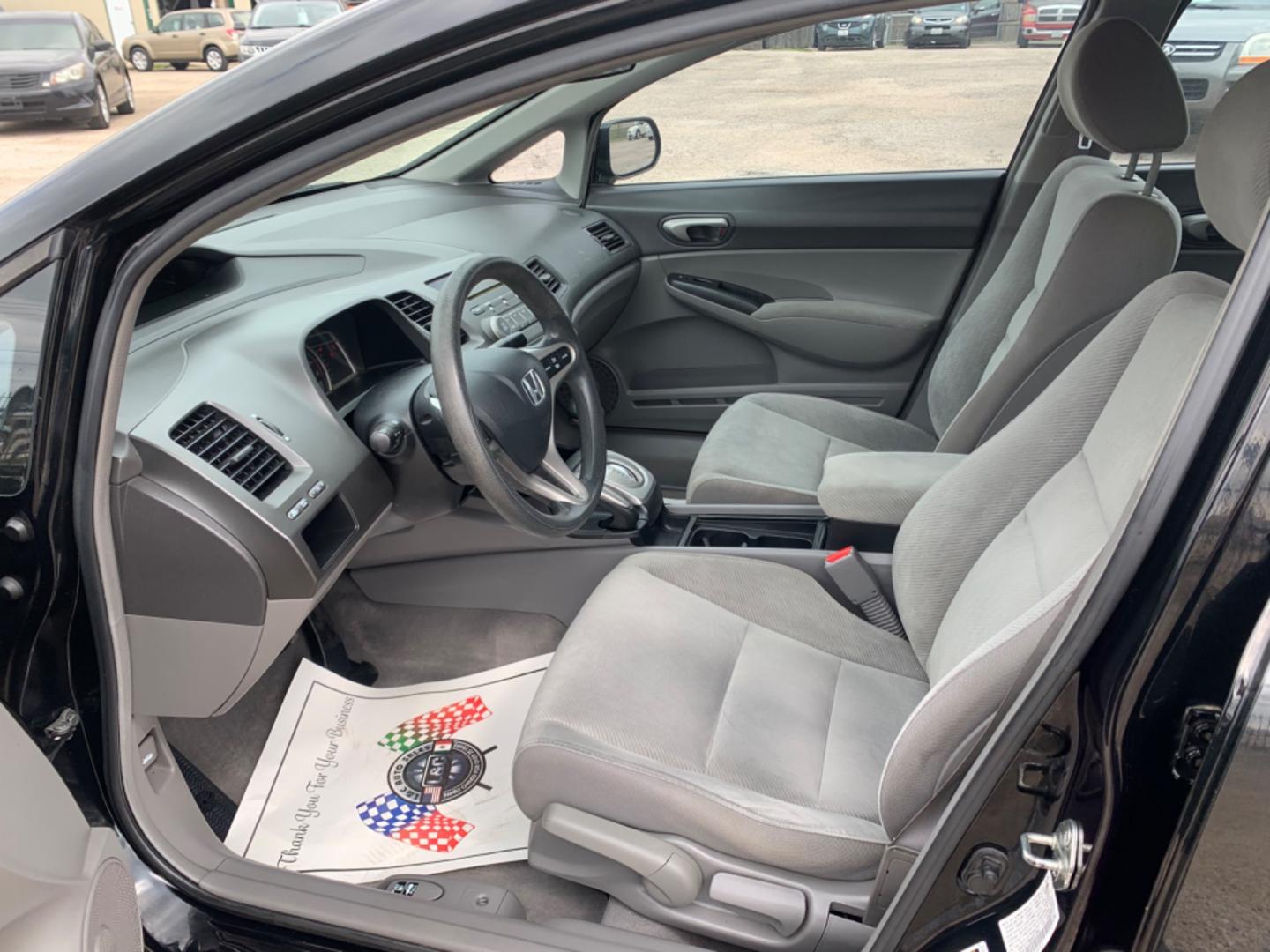 2010 Black /gray Honda Civic LX Sedan (19XFA1F56AE) with an 1.8L L4 SOHC 16V engine, Automatic transmission, located at 1830 North Belt Line Road, Irving, TX, 75061, (469) 524-0199, 32.834373, -96.993584 - Photo#7